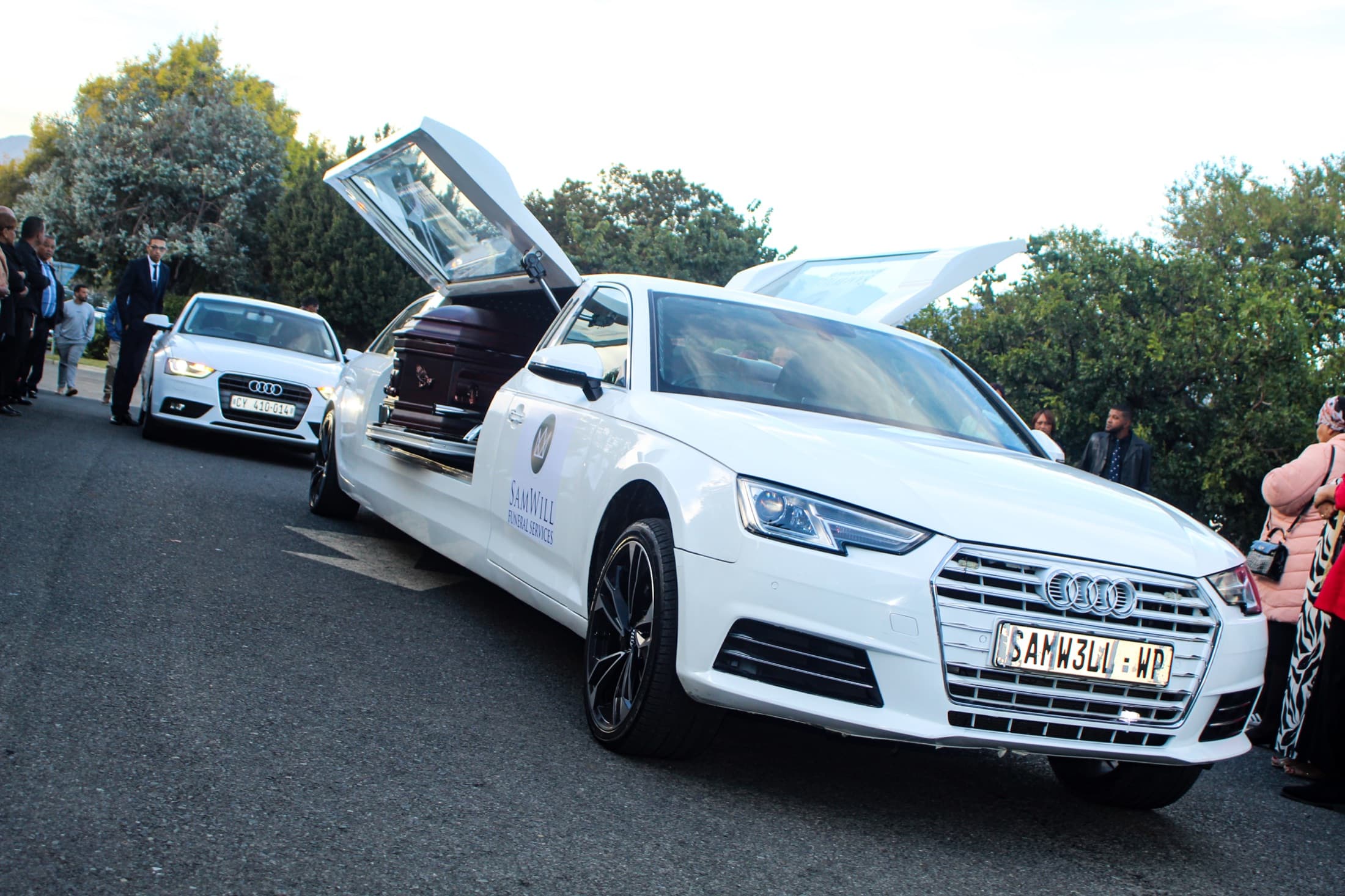 A SamWill hearse prepared for a service